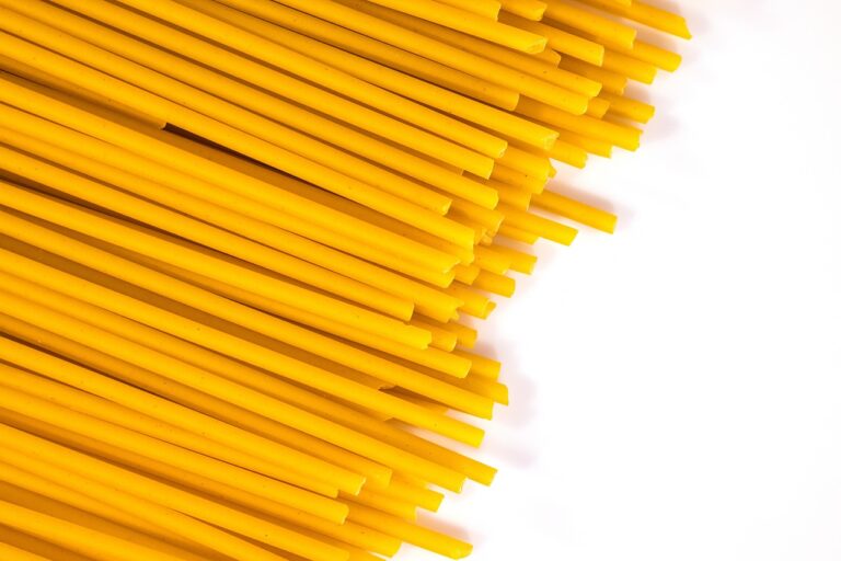 Raw wheat spaghetti stacked together, pasta that contains gluten